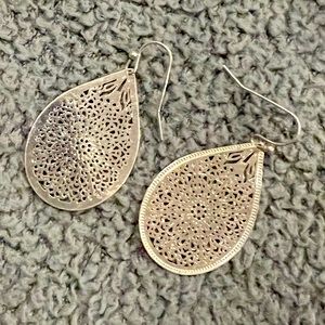 Silver cutout flower earrings
